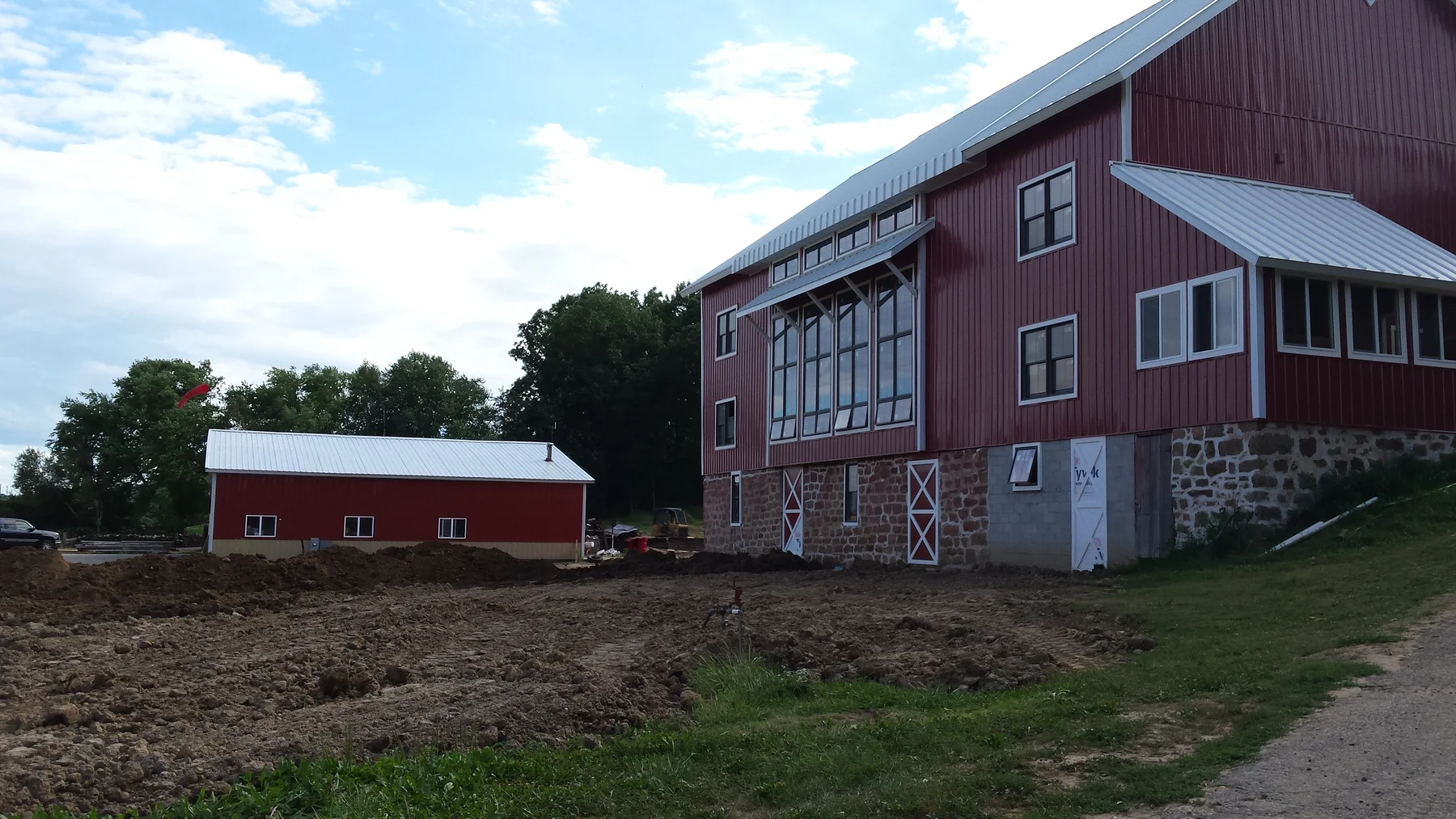 The exterior taking shape around the original stone base.