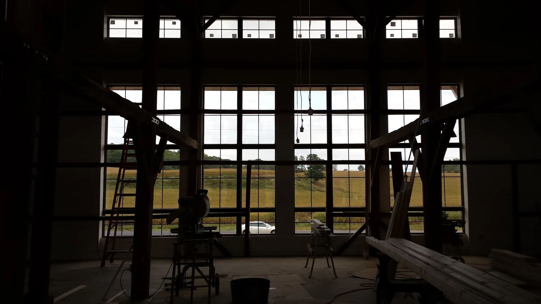 Light through the tall barn windows before the interior was finished.