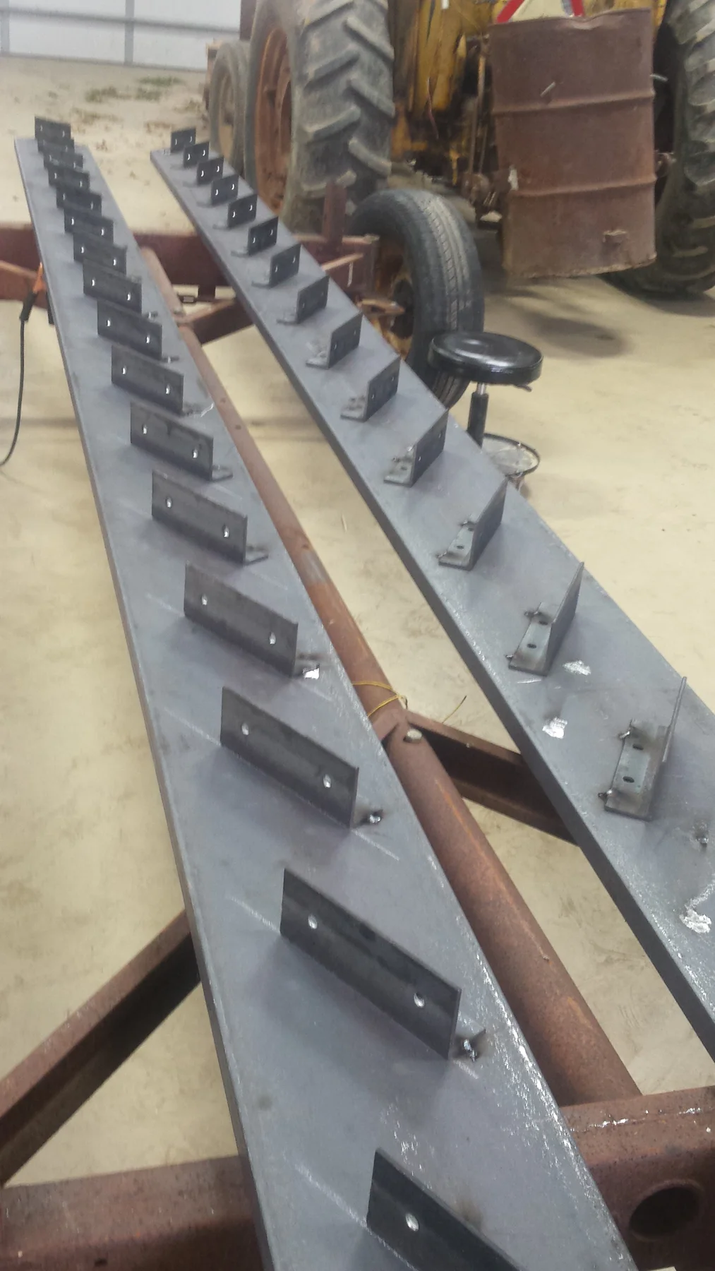 Rail plates and hardware laid out for the stair system.