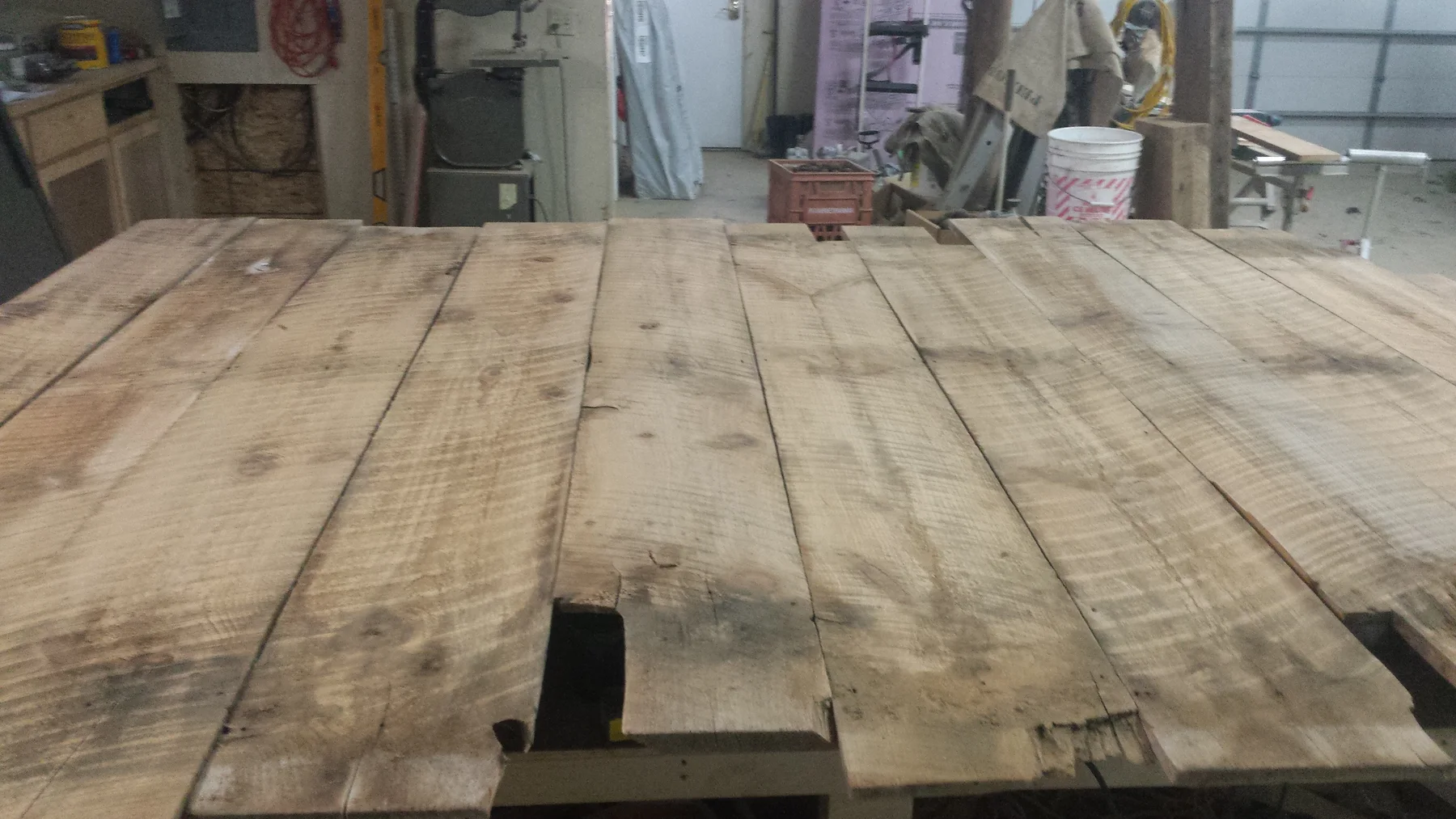 Barn boards chosen for the long dining table top.
