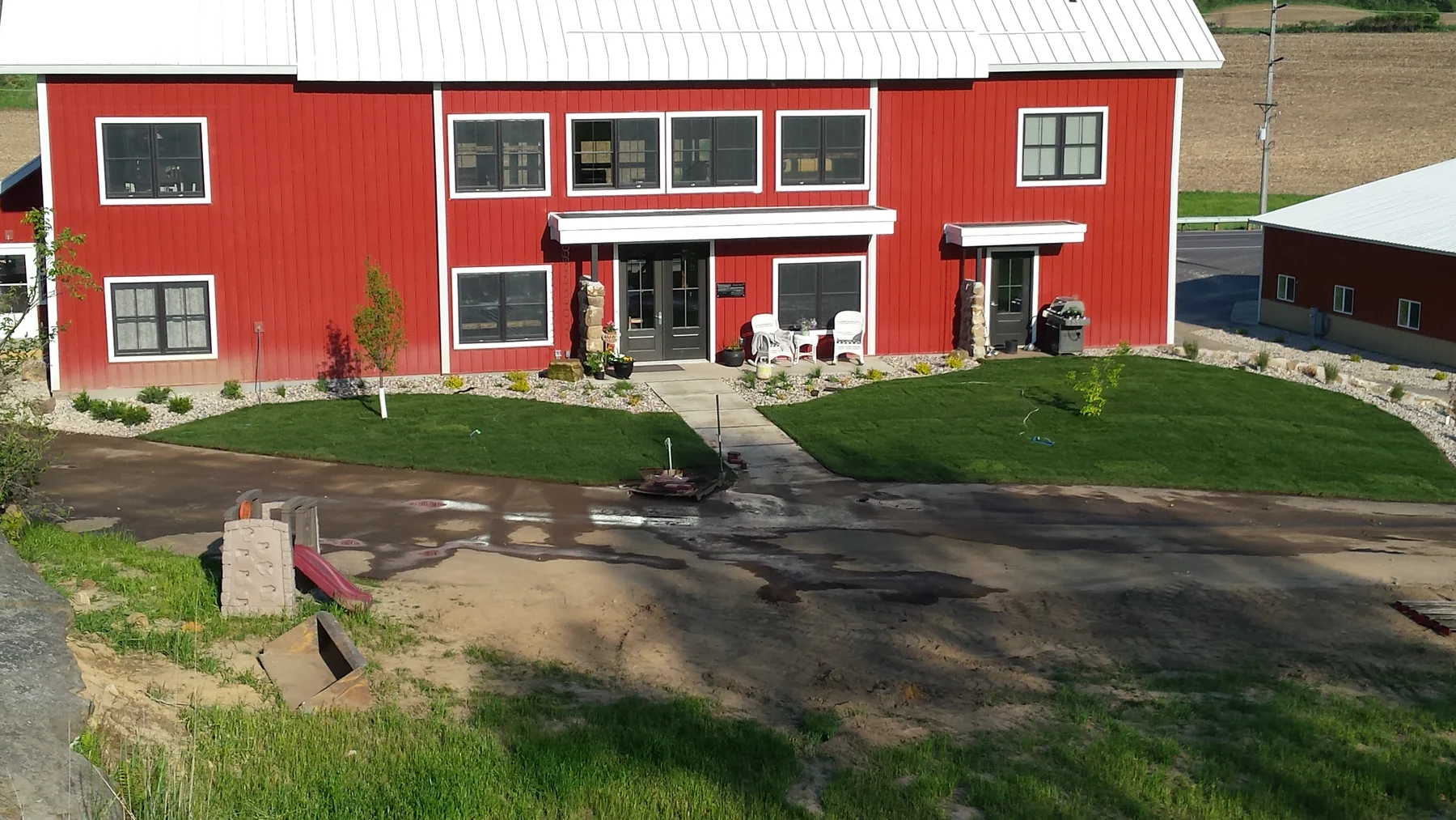 The finished exterior with new landscaping.