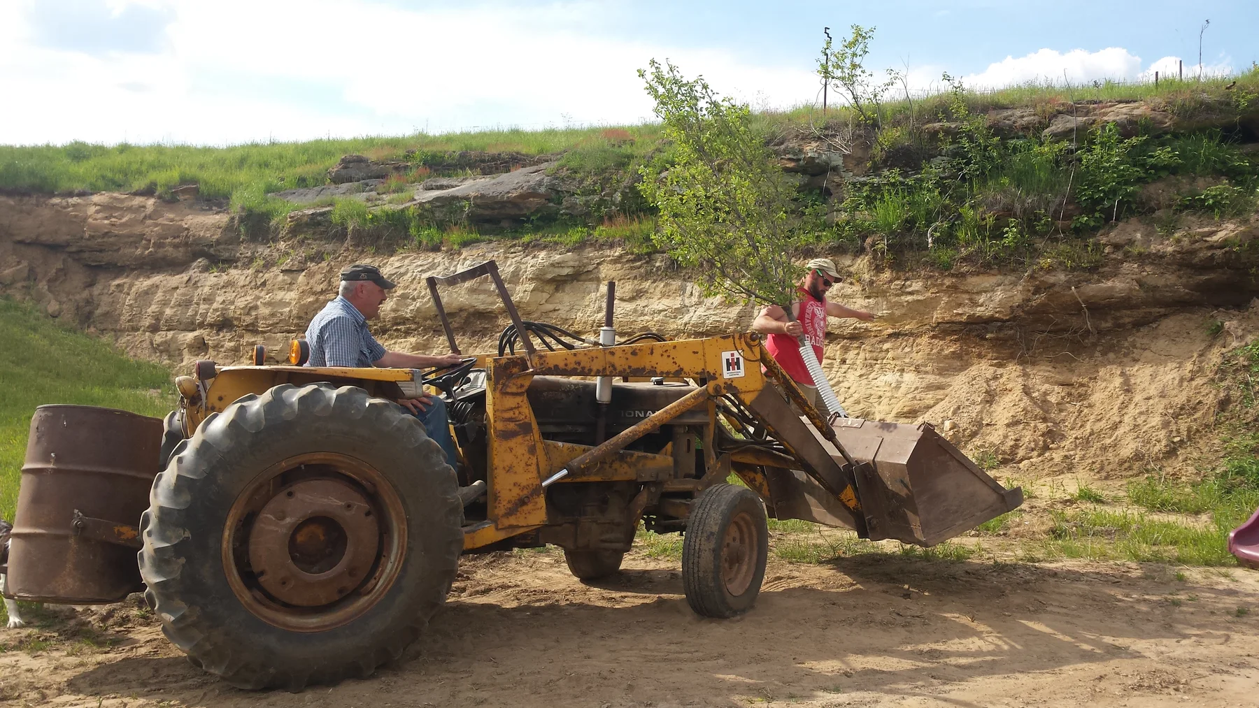 Grading and landscape work around the barn.