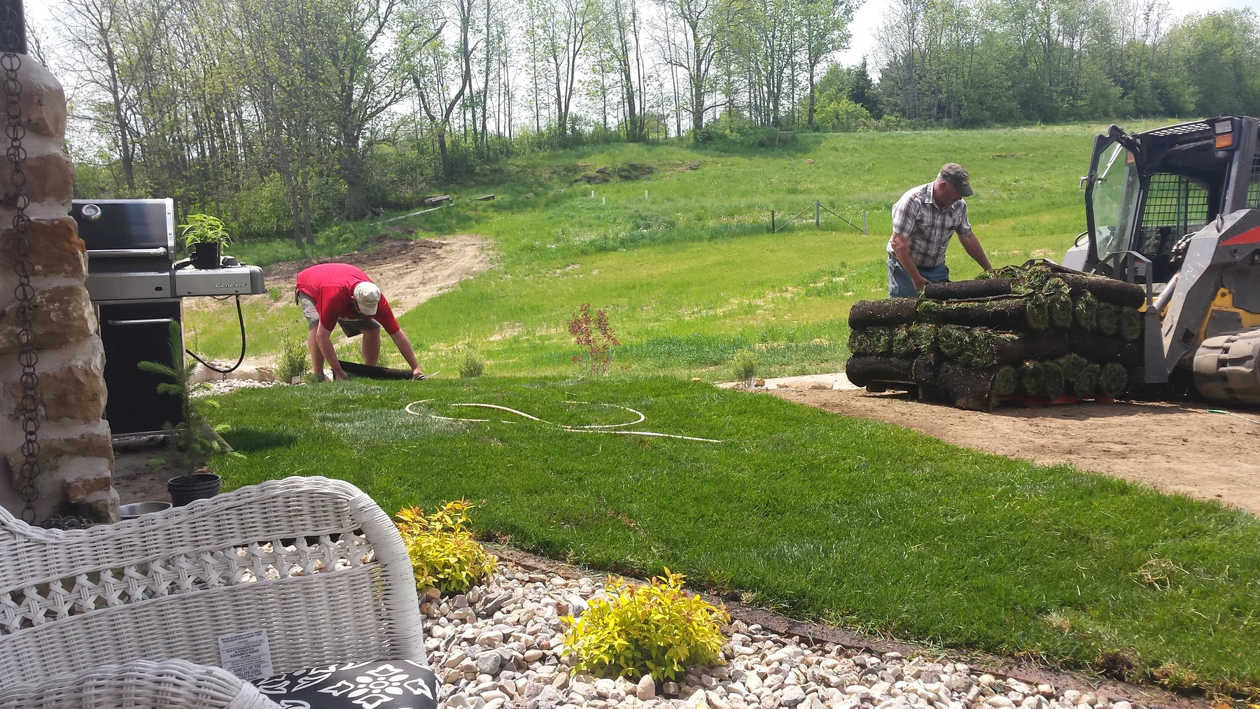 New grass going in around the barn.